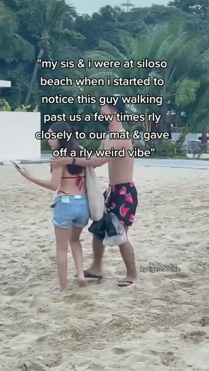 best nude beach voyeur - Guy caught red-handed at Sentosa : r/singapore