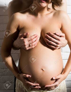 cute pregnant girls nude - Family Parent Couple Of Pretty Happy Sexy Woman Or Cute Pregnant Girl With  Naked Round Belly And Man Holds Hands On Chest On Brick Wall Background At  Mothers Day Stock Photo, Picture