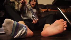 Asian Sock Porn - Asian babe shows her exotic feet while playing with stinky socks on the  floor - Feet9