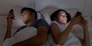 Benefits Of Porn - benefits of porn : couple using smartphones