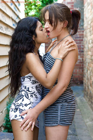 Indian Lesbians - ... Indian lesbian Kiki tongue kissing white girlfriend Lou-Ellyn outdoors  ...
