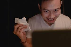 horny asian funny - Premium Photo | Funny horny face of asian man watching porn at night.