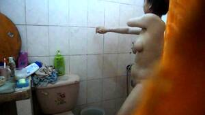 asian voyeur shower room - Voyeur Spying On A Busty Mature Asian Wife In The Bathroom Video at Porn Lib