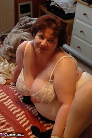 mature chubby slut - Chubby mature slut is seen playing with her huge natural boobs. Chris44G.  Picture 5.