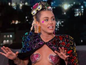Big Boobs Porn Miley Cyrus - Miley Cyrus Wears Pink, Heart-Shaped Breast Pasties on Jimmy Kimmel Live!