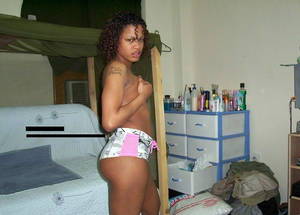 Nasty Black Bitch Porn - Nasty black bitch posing naked in a room | Picture #1