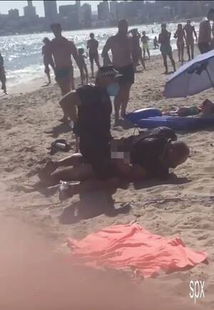 Exhibitionist Nude Beach Sex - Benidorm cops rugby tackle naked exhibitionist who shocked families by  stripping nude on packed beach | The US Sun