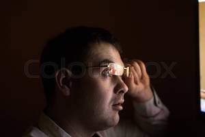 Black Man Glasses Porn - Young attractive businessman alone at night sitting at computer laptop  watching porn or online gambling which reflecting in his glasses isolated  on black ...