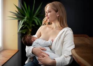 lactating mom boobs - Nude Breastfeeding Images - Free Download on Freepik
