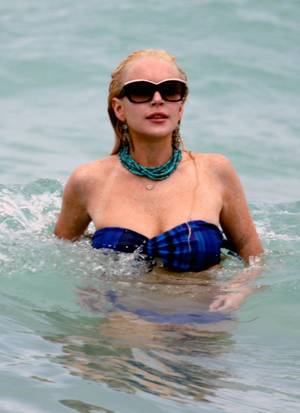 lindsay lohan topless beach boobs - Lindsay Lohan Blue Bikini Boob-Slip Candid Photos From Miami - Young chick  gets nailed