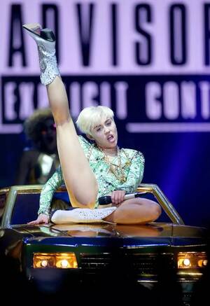 bikini shemale miley cyrus - Miley Cyrus drugs London show: Swears at crowd ''you bunch of s**ts'', says  they've ''been taking pills'' - Irish Mirror Online