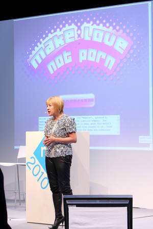 no. porn videos - Cindy Gallop stands in front of a presentation slide reading \