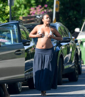 Michelle Obama Tits - Sasha Obama wears bikini top, oversize pants as she smokes cigarette