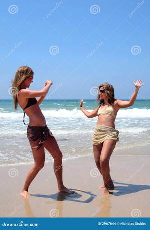 exotic beach babes voyeur - Pretty Women Playing on Beach Stock Photo - Image of ocean, summer: 2967644