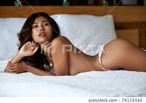 Hot Sexy Asian Girls Nude - Sexy asian naked girl laying on the bed - Stock Photo [79119388] - PIXTA
