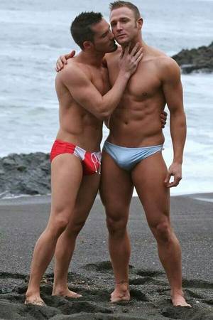 couple nude beach thong - 2 HOT gay dudes posing on the beach in their Speedos.