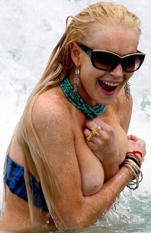 lindsay lohan topless beach boobs - Lindsay Lohan naked shows her tits, lingerie and upskirt panties shots |  jaime's artwork