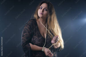 hot plus size girl nude - Young naked beautiful caucasian plus size model, xxl woman in black  peignoir on smoky background, beauty female nude body with big breast foto  de Stock | Adobe Stock