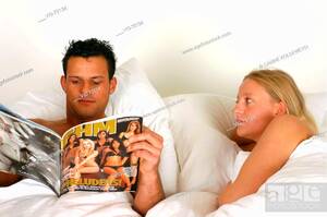 Couple Reading Porn - Couple in the bed with a porn magazine (posed). - 22/08/2004, Stock Photo,  Picture And Rights Managed Image. Pic. VIG-73134 | agefotostock