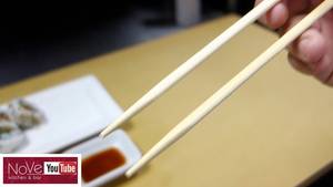 demonstrates chopsticks - 