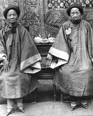 foot binding - Two Chinese women with (concealed) bound feet