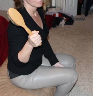 femdom hair brush otk spanking gif - Wife with hairbrush at the ready