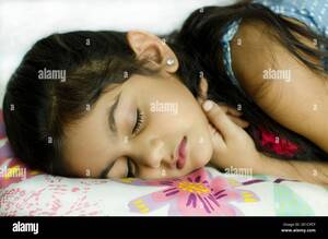 indian girl sleeping nude - Indian girl sleeping in bed hi-res stock photography and images - Alamy