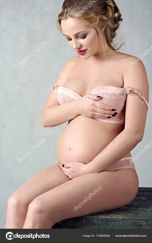 hot pregnant model nude - Closeup beautiful pregnant lady in elegant pose Stock Photo by Â©pvstory  174644590