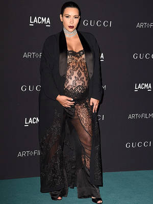 Kim Kardashian Outrageous - Pregnant Kim Kardashian Sheer Jumpsuit