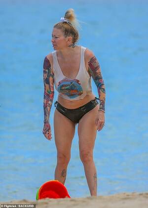 candid nude beach hawaii - Jenna Jameson flashes the flesh in skimpy crop top and black strap bikini  bottom during Hawaii trip | Daily Mail Online