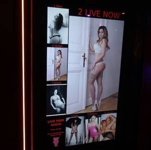 live sex peep show - Amsterdam Peep Show: Exploring the Red Light District in 2024 |Amsterdam  Red Light District