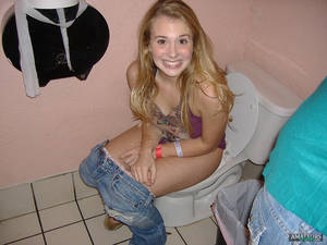 girls peeing on toilet - forced awkward smile by teenage girl peeing in toilet