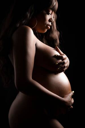 african naked pregnant ladies - Beautiful pregnant African-American woman studio nude backlit on black  background by Paul Evan Green on YouPic