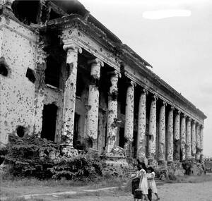40s War Porn - Filipino students walk past on one the war damaged buildings on the campus  of the University of the Philippines, Manila, Late 1940s. The campus and  city would see intense fighting during the