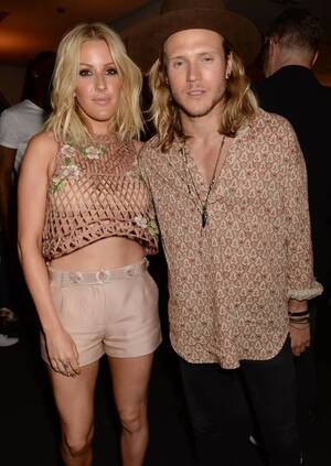 Ellie Goulding Porn Captions - Ellie Goulding and Dougie Poynter match up again as star flashes her bra in  nude outfit - Mirror Online
