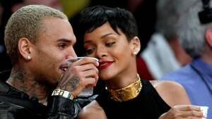 Chris Brown Porn - Rihanna, Chris Brown get cozy at basketball game