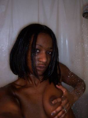 dark skin black naked hoes - Dark skinned amateur teen with small firm tits and bald pussy takes a shower