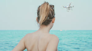 naked chicks voyeur beach pics - Drone voyeurs in hot water after filming nude sunbathers