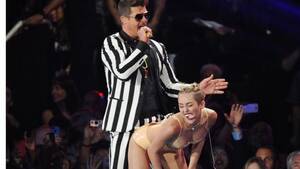 Miley Cyrus Robin Thicke Porn - MTV VMAs: Miley Cyrus performance sparks criticism - video | Music | The  Guardian