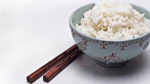 demonstrates chopsticks - If White Rice Is Linked to Diabetes, What About China?