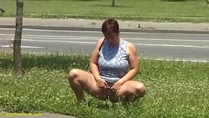 bbw pissing in public - redhead bbw milf peeing on public street while she sucks her big natural  breasts - XNXX.COM