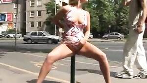 Busy Street Porn - Model pissing on a busy street