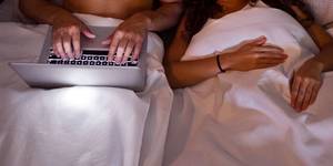 Adventure Couples Sex Porn - Couple using a laptop in bed together. Getty Images. While watching adult  ...
