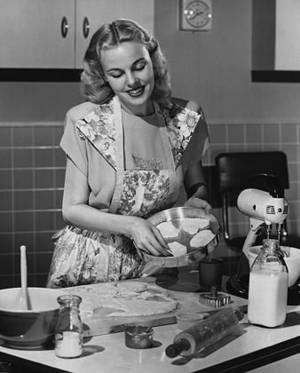 1950 Housewife Retro Kitchen Porn - Happy housewife and her biscuits.