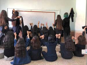 Asian School Sex - Iranian schoolgirls 'forced to watch porn' to dissuade protests: Report |  Al Arabiya English