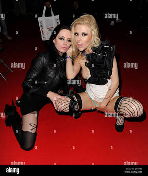 Michelle Moist - Porn Star Michelle Moist plays around with a friend at Erotica. Erotica  2011 held at Olympia. London, England - 20.11.11 Stock Photo - Alamy