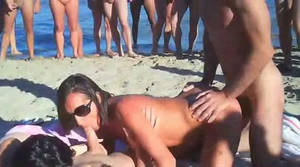 handjob nudist swingers - Amateur swingers on the nudist beach having groupsex