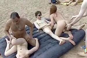 group sex nude - Outdoor group sex on nude public beach