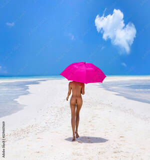 model walking on beach naked - Sexy nude body woman on paradise tropical beach having fun on Maldives.  Beautiful naked female model
