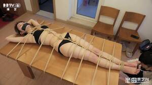 asian tied to table - BoundHub - Asian Table Bondage